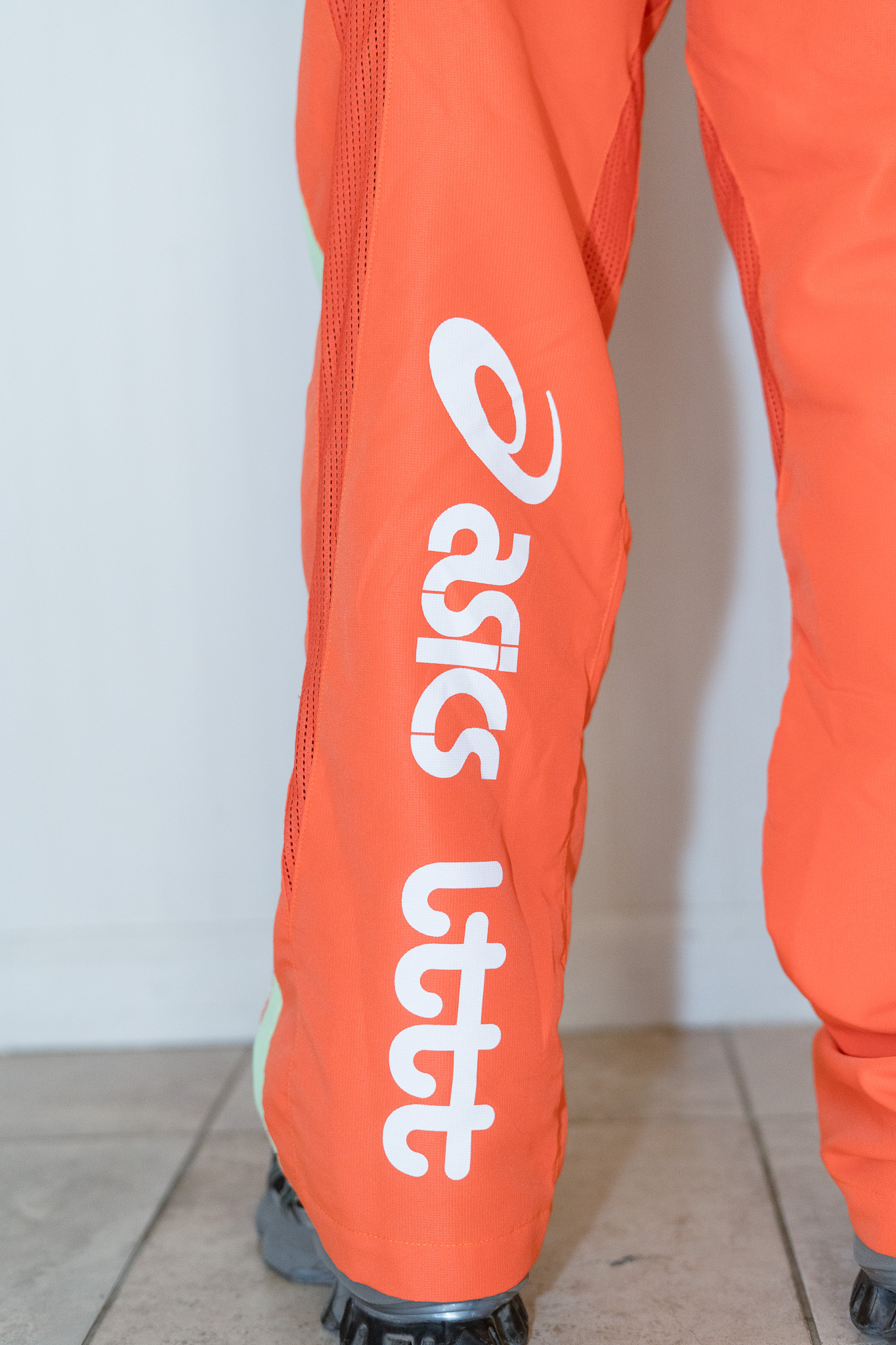 LTTT ASICS Training Pant - Orange --LTTT recently celebrated their fourth birthday, so accordingly I had to celebrate with them by making this purchase. I was in LA on the day of their birthday party but was not near the area so I did not make it to the TikTok fashion mf meetup of the century.  --Every colorway of the pant was stunning, but I purchased the orange pair because I wanted to live out my highlighter kid dreams. It was definitely a decision, one that I don't know if I can completely stand behind to this day, but I like to think of it as exposure therapy and embracing taking up (visual) space in the world. There are many cool details on the pants, but the panelling of various colors and materials stand out to me in particular. I have had these pants since July 2025. 