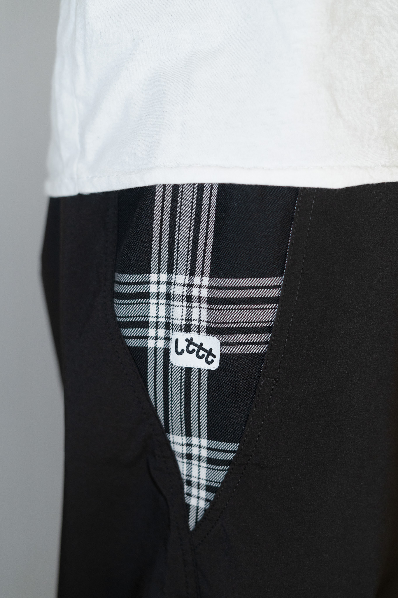 LTTT Bungee Pants V.3 - Black --These pants were part of the aforementioned birthday celebration. I had seen these pants on their site a while ago when they first dropped and always really liked the plaid pocket detail. Initially, I wasn't super crazy about the bungee cinching detail, but that has since become my favorite part about these pants.  --It took a little longer for this pair to arrive than it did for the ASICS pair because they originally sent me the black ASICS pants, which I desperately wanted to keep. LTTT's customer service was very nice and personable - it felt quite pleasant coordinating the exchange. They even sent me a super cool tote to make up for the mixup. Much love to Kyle Chen. I have had these pants since August 2025. 