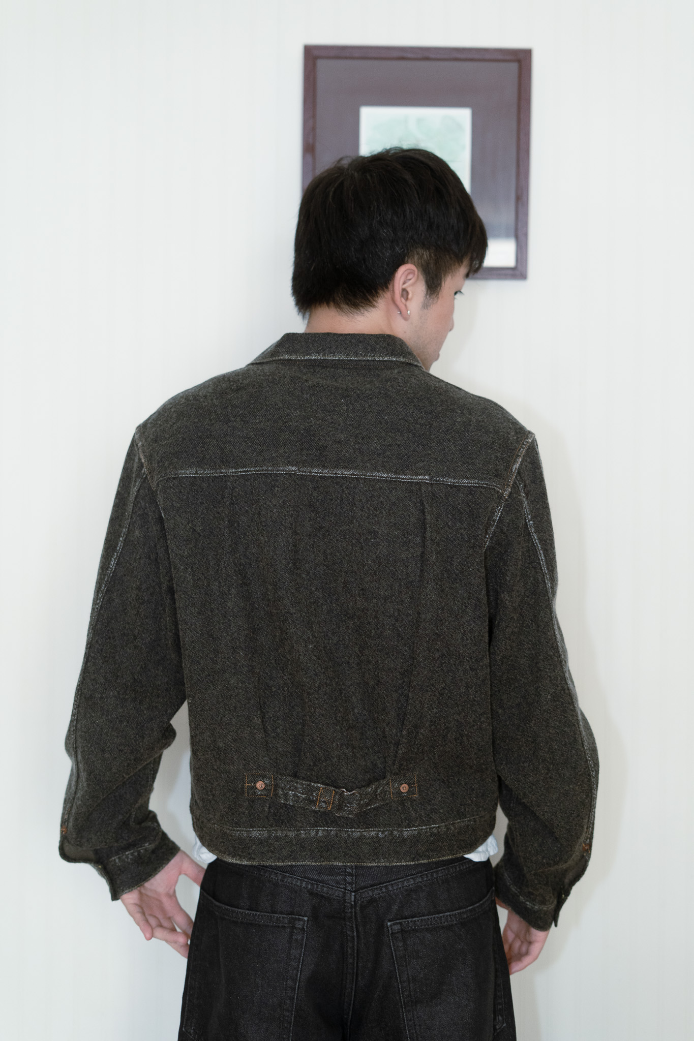 Kapital Twill Aging-Wool 1st Jacket - Faded Charcoal --This is my first Kapital piece. I bought it at the Tokyo Naked Store during my first trip to Japan. I knew I wanted to find something in the neighborhood of a denim jacket during my time there, and when I came across this piece, I knew it was the one. The sales associate definitely planted some seeds in my head to get me to buy it - he said it was the only one of its size left in stores (my size was in stock online) (I guess I couldn't have it shipped to me anyways because we were only in Japan for a couple more days) but I do not blame him one bit.  --Modeled after the Levi's Type 1 jacket, it has all the characteristics of the jean jacket I was looking for, but with a softer touch and less country Americana energy that fits better into my style. I love the contrast stitching around all the hems that give it this sort of aged look without being worn. I am scared to get it wet because it is made of wool. One time I was caught in the rain with it without an umbrella. Luckily I escaped and the jacket is fine. I hope I never have to wash it. On that trip, Suanna ended up getting the same jacket but in the red colorway in Kyoto. I have had this jacket since December 2024. 